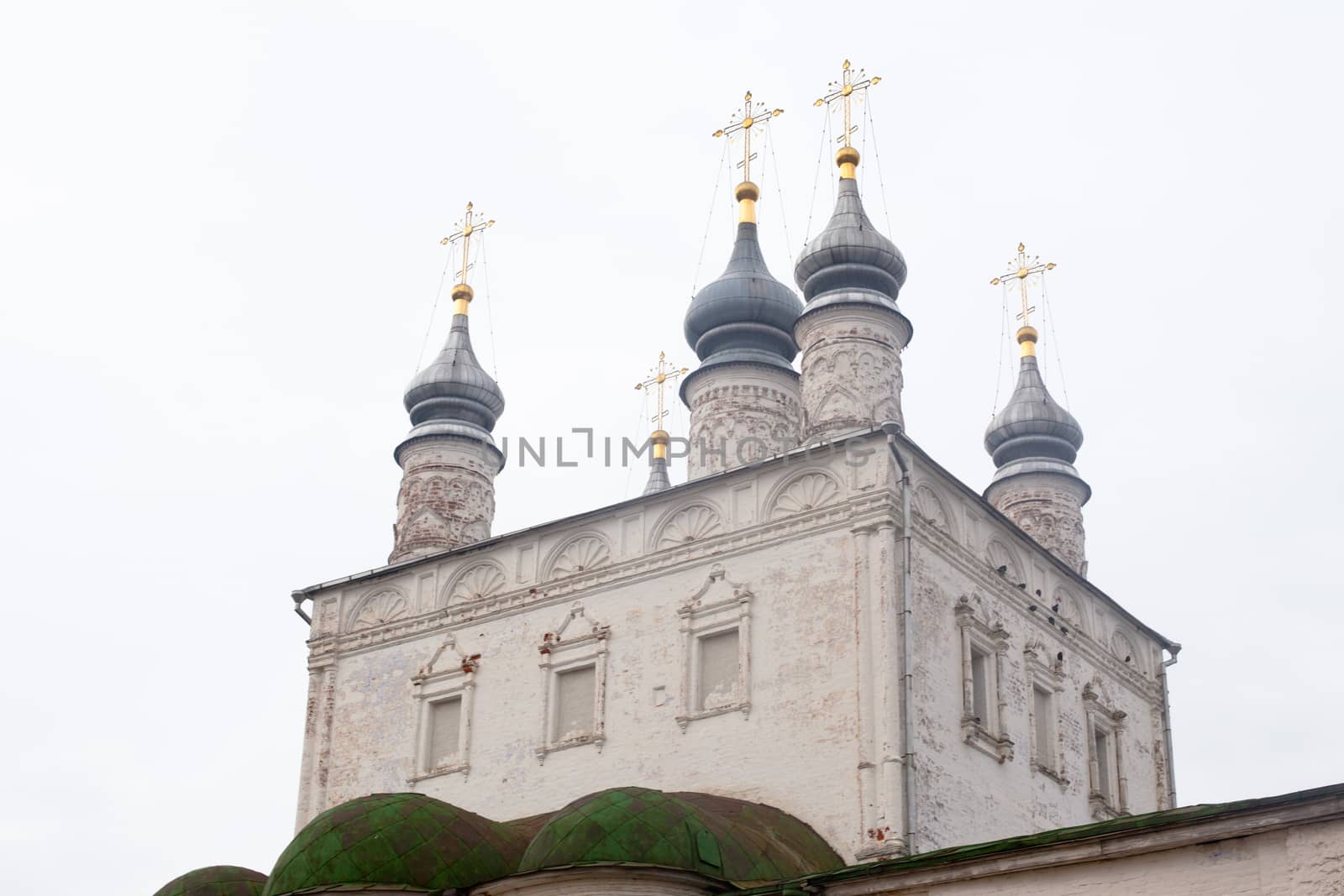 White orthodox church with grey dome

