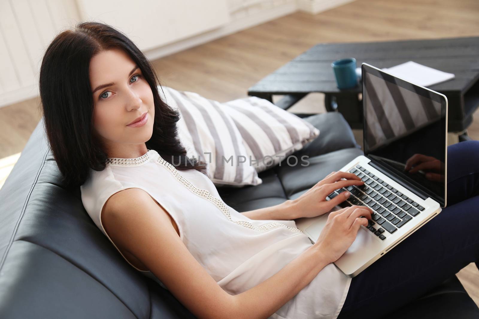 Brunette. Beautiful girl at home