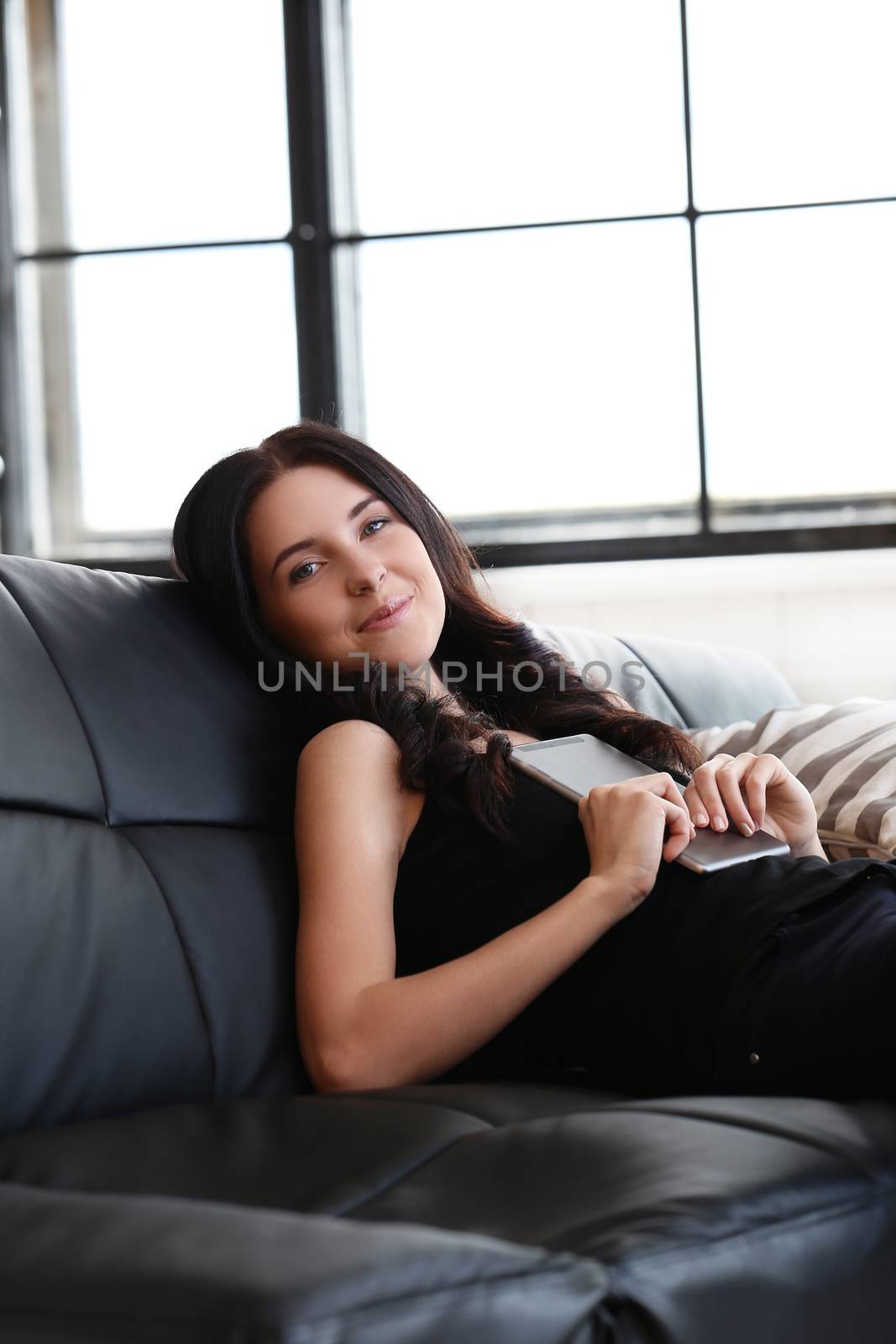Brunette. Beautiful girl at home