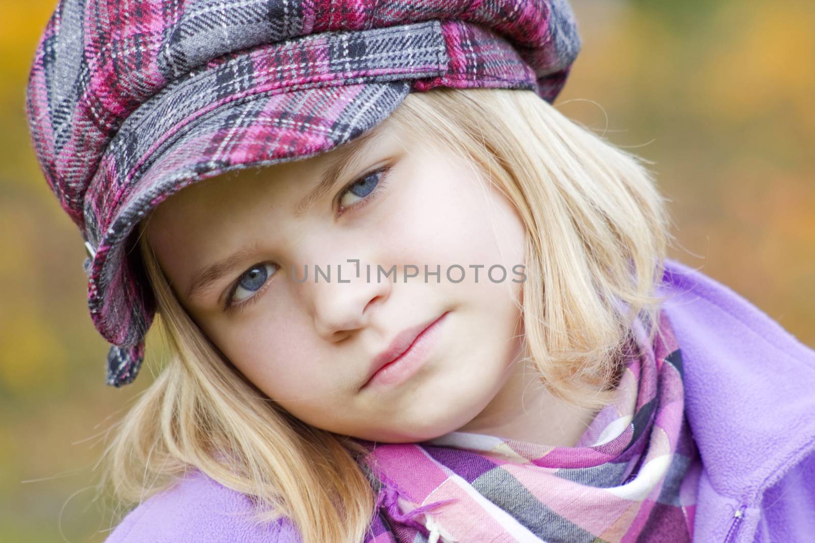 Autumn portrait of a lovely little girl by miradrozdowski