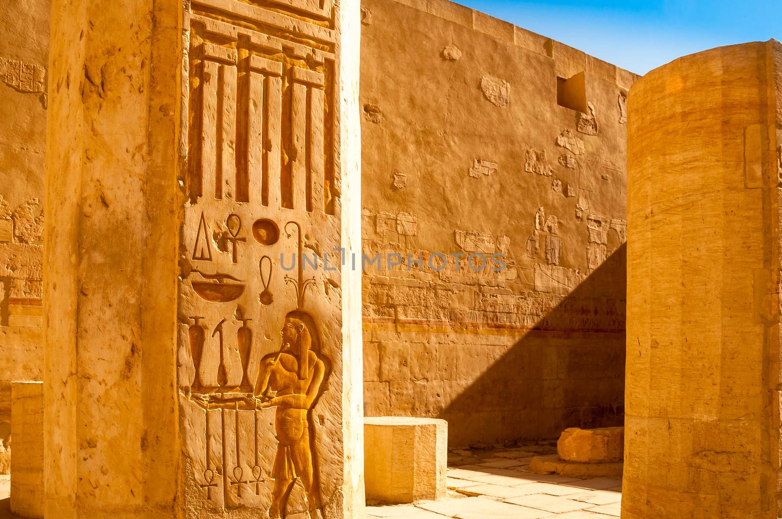 Detail of ancient hieroglyphs carved in stone walls, Queen Hatshepsut temple, Egypt