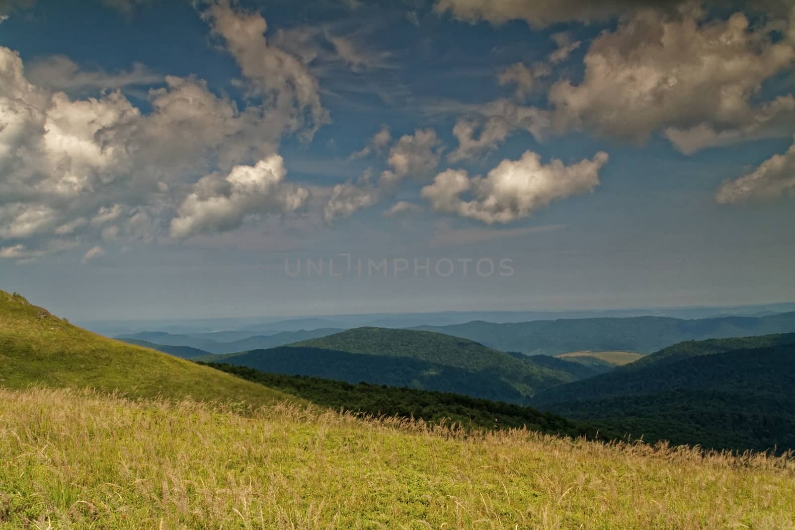 Poland,summer.Bieszczady mountins.Extensive, lightly blurred view on distant peaks