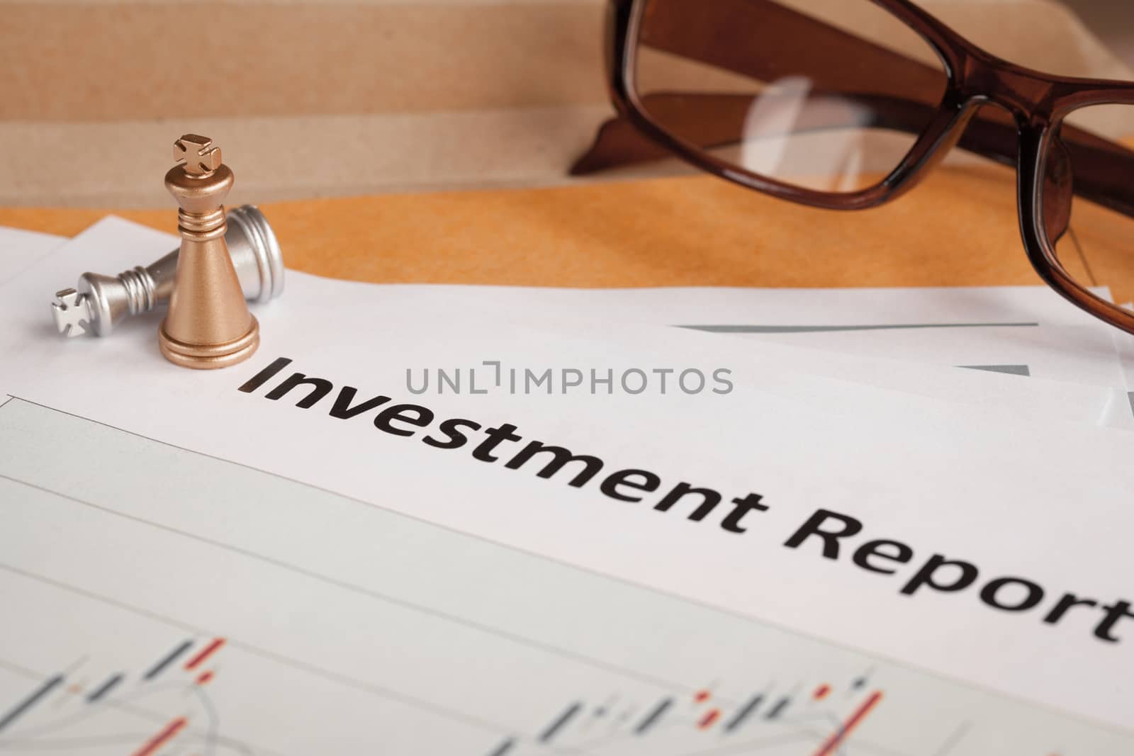 Investment Report letter document and eyeglass; document is mock by FrameAngel