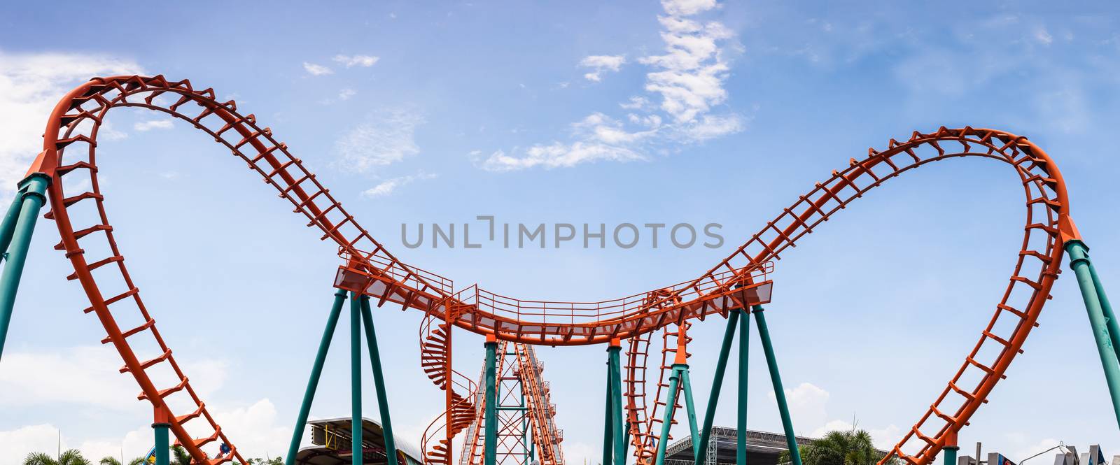 Roller Coaster, rail way curve and spin heart shape as panorama background