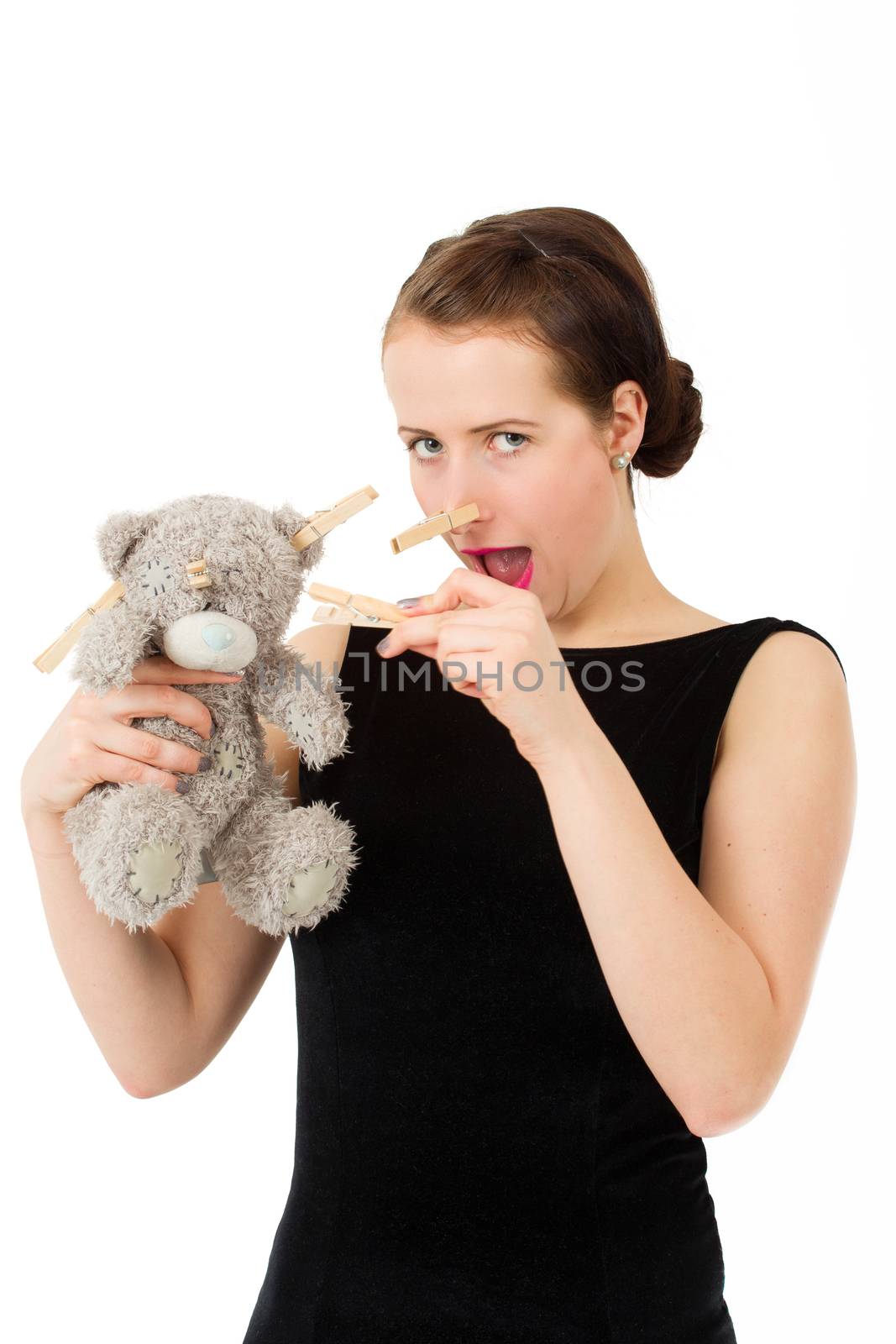 attractive smiling brunette holding teddy bear grimacing with pe by artush