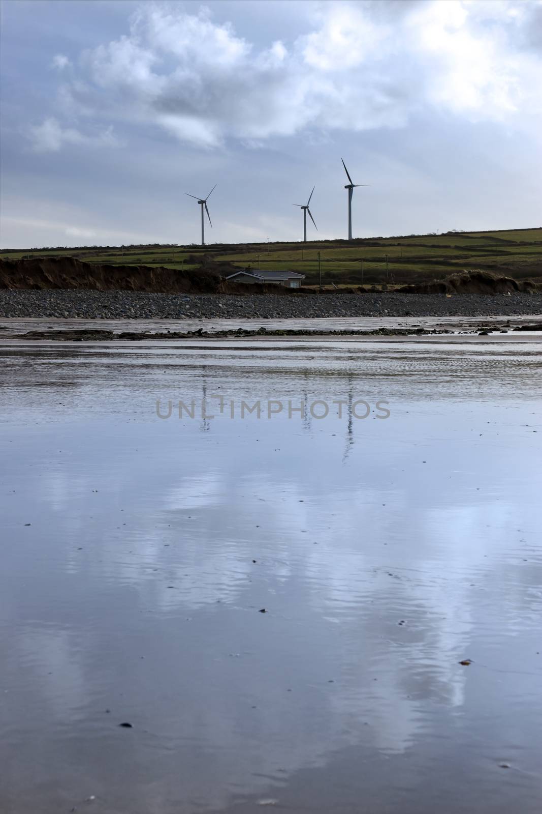 windmills reflected on Beal beach by morrbyte