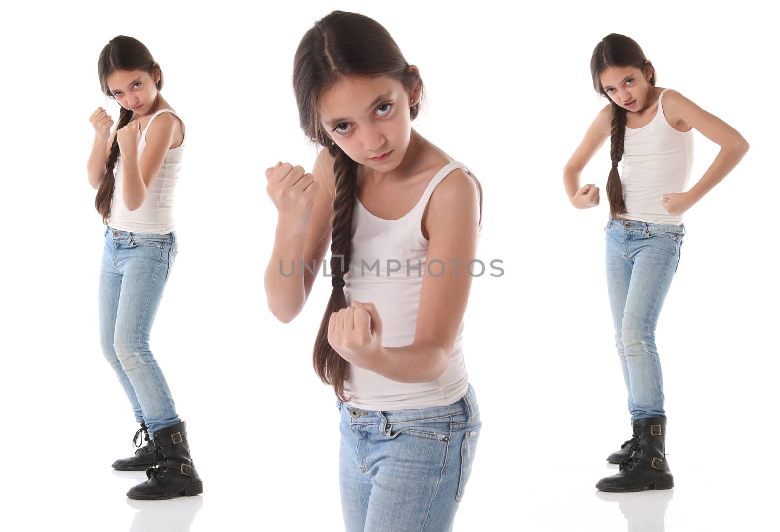 A beautiful young girl wants to fight. Isolated on white background