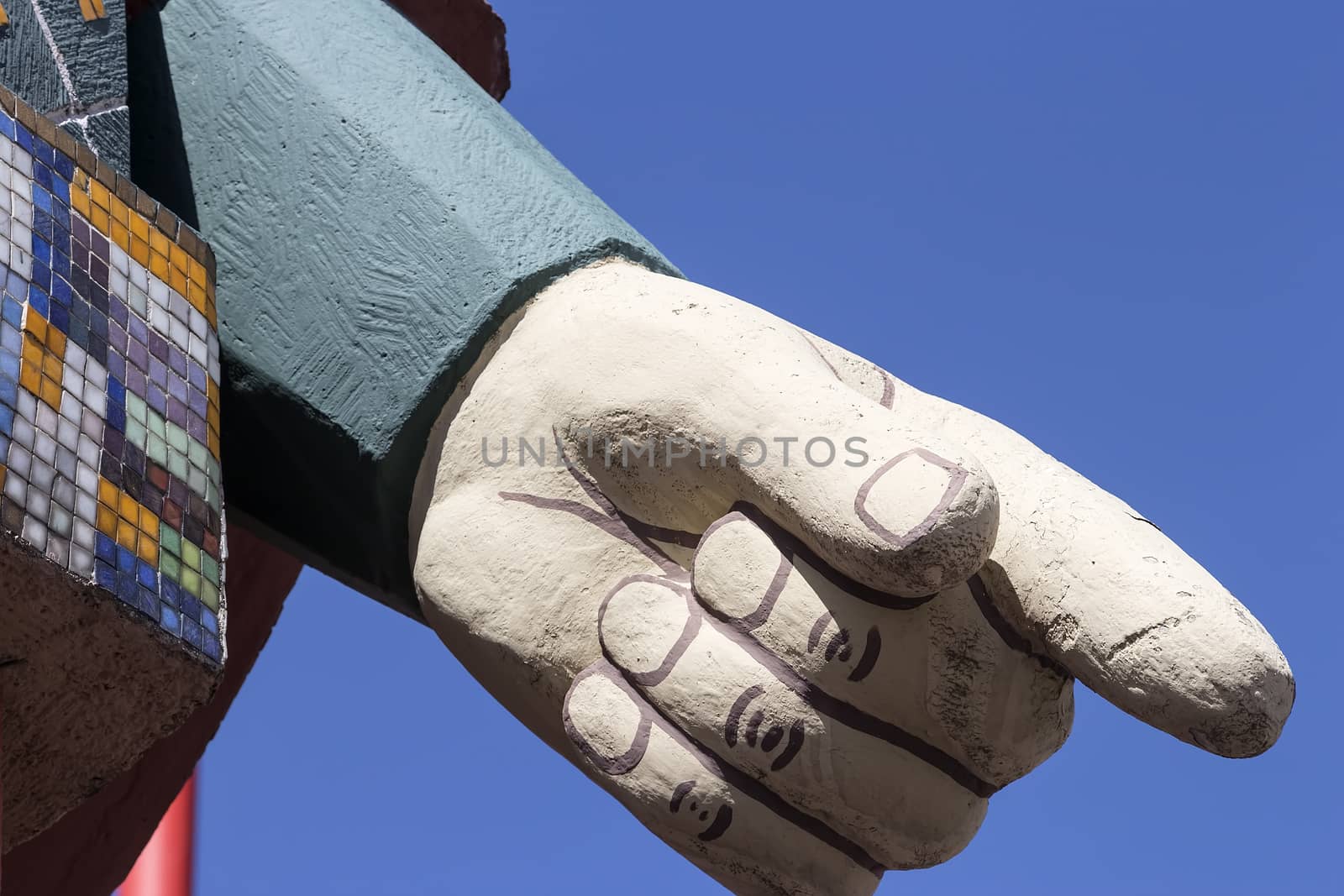 A big finger on an statue