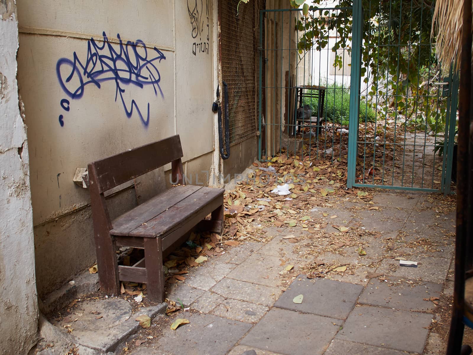 Dirty old grunge backyard of a house in a poor downtown area   