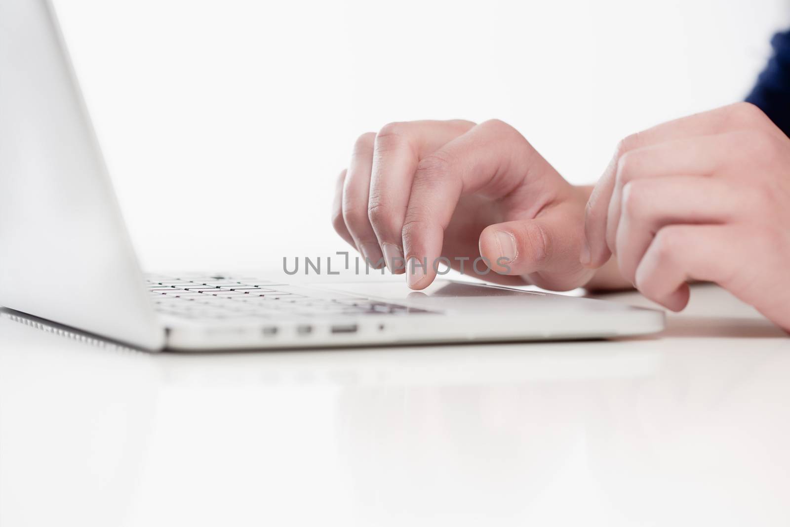 Closeup of Fingers Using Keyboard by courtyardpix