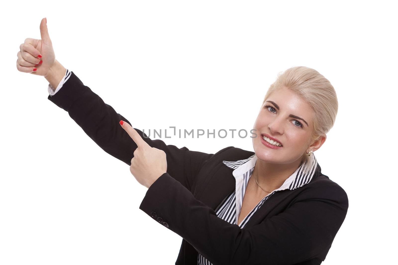 Close up Pretty Smiling Young Businesswoman Pointing Up with her Two Hands While Looking at the Camera. Isolated on White Background.