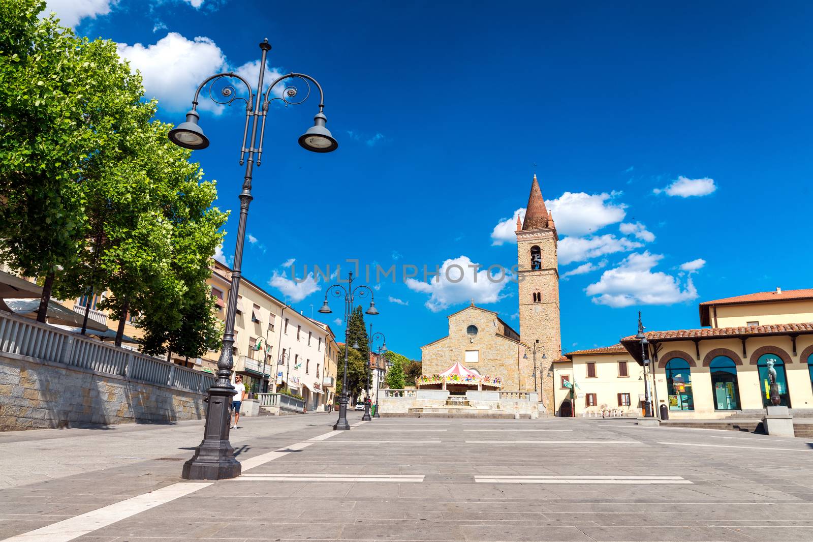 AREZZO, ITALY - MAY 12, 2015: People walk in Saint Augustin Squa by jovannig