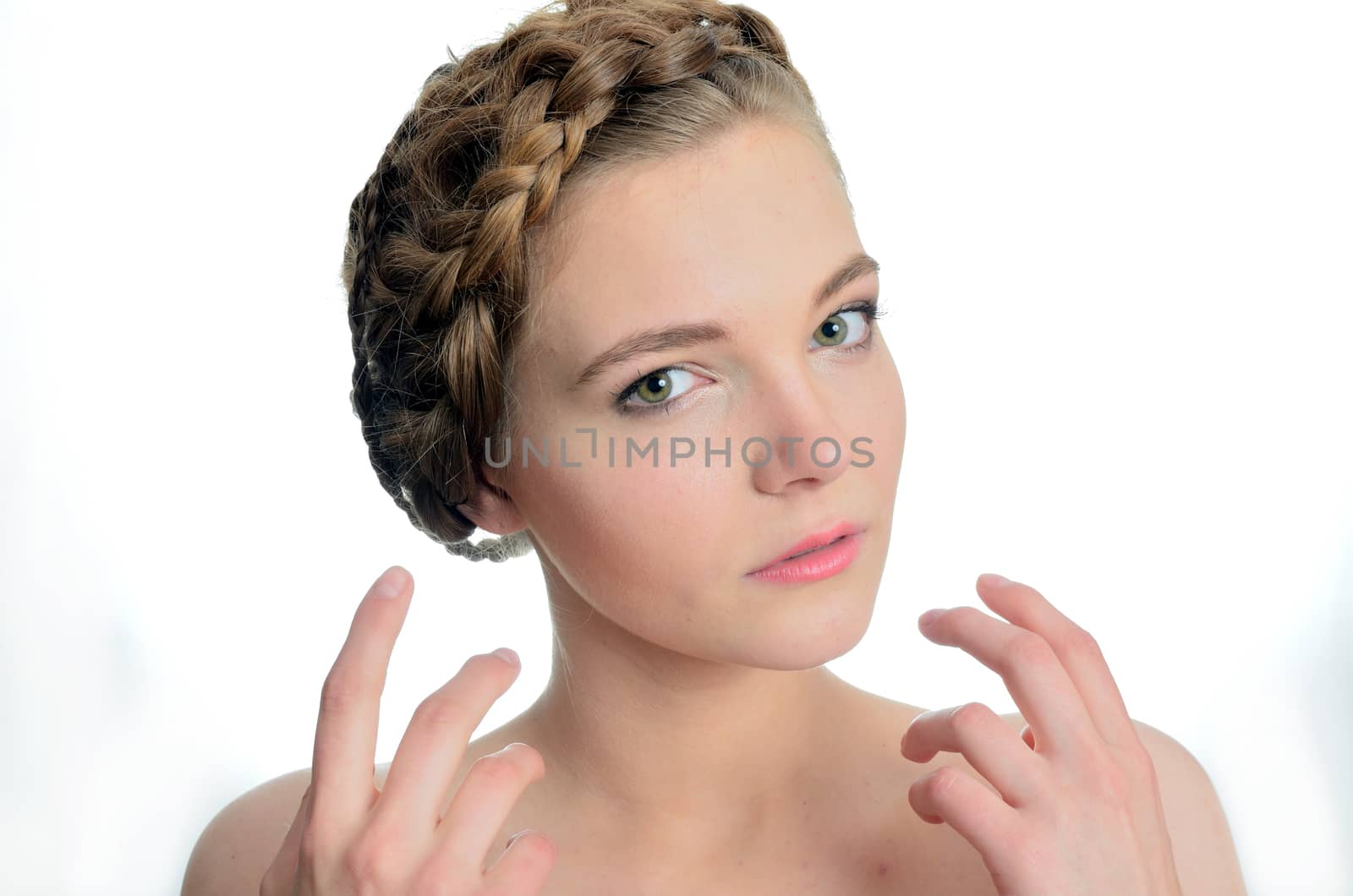 Female model from Poland. Young girl with blond hairs. Portrait with hands gesture.