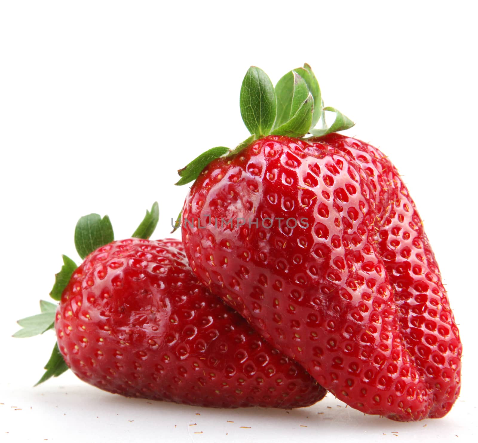 Strawberries With Leaves Isolated On A White Background