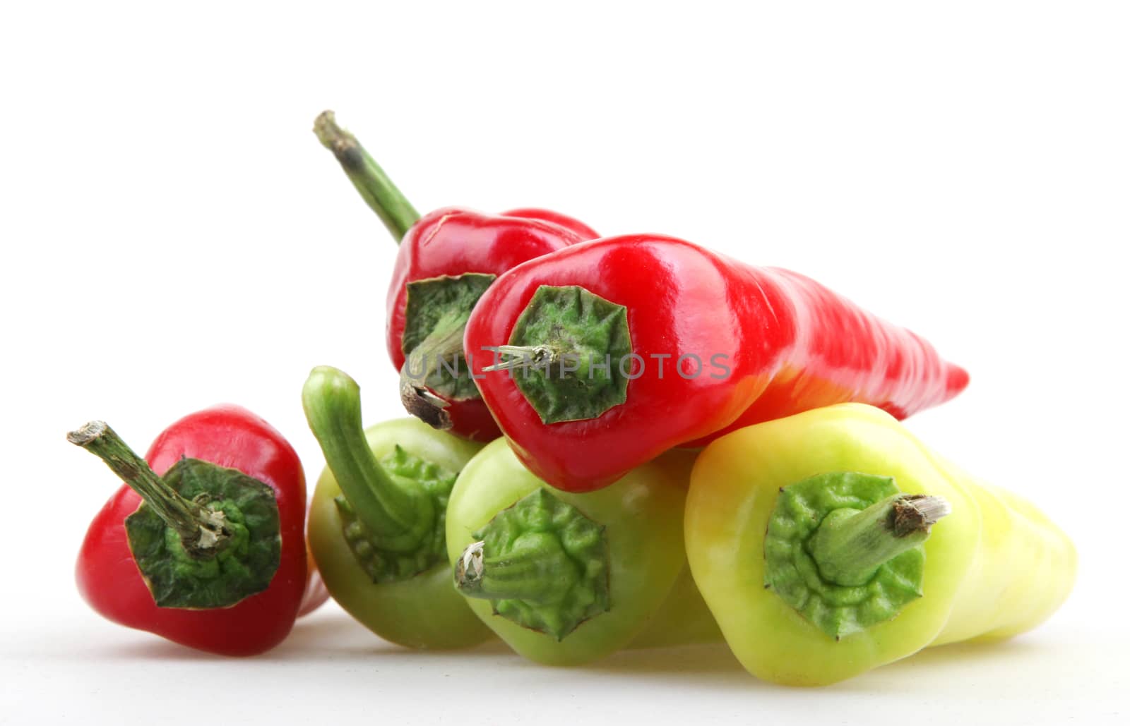 Red peppers on white background