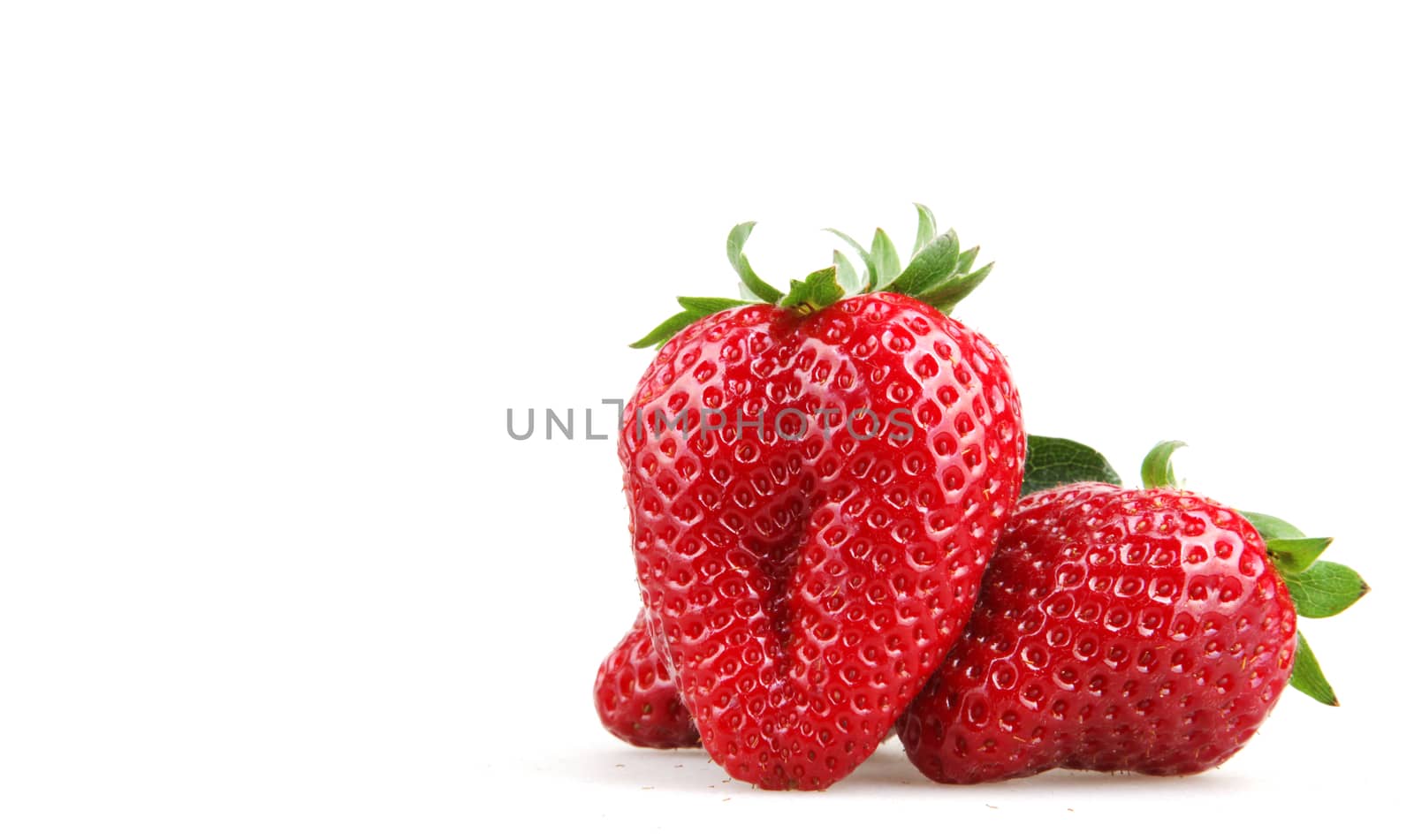 Strawberries With Leaves Isolated On A White Background