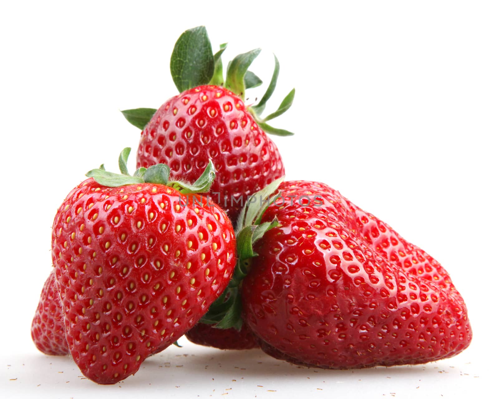 Strawberries With Leaves Isolated On A White Background