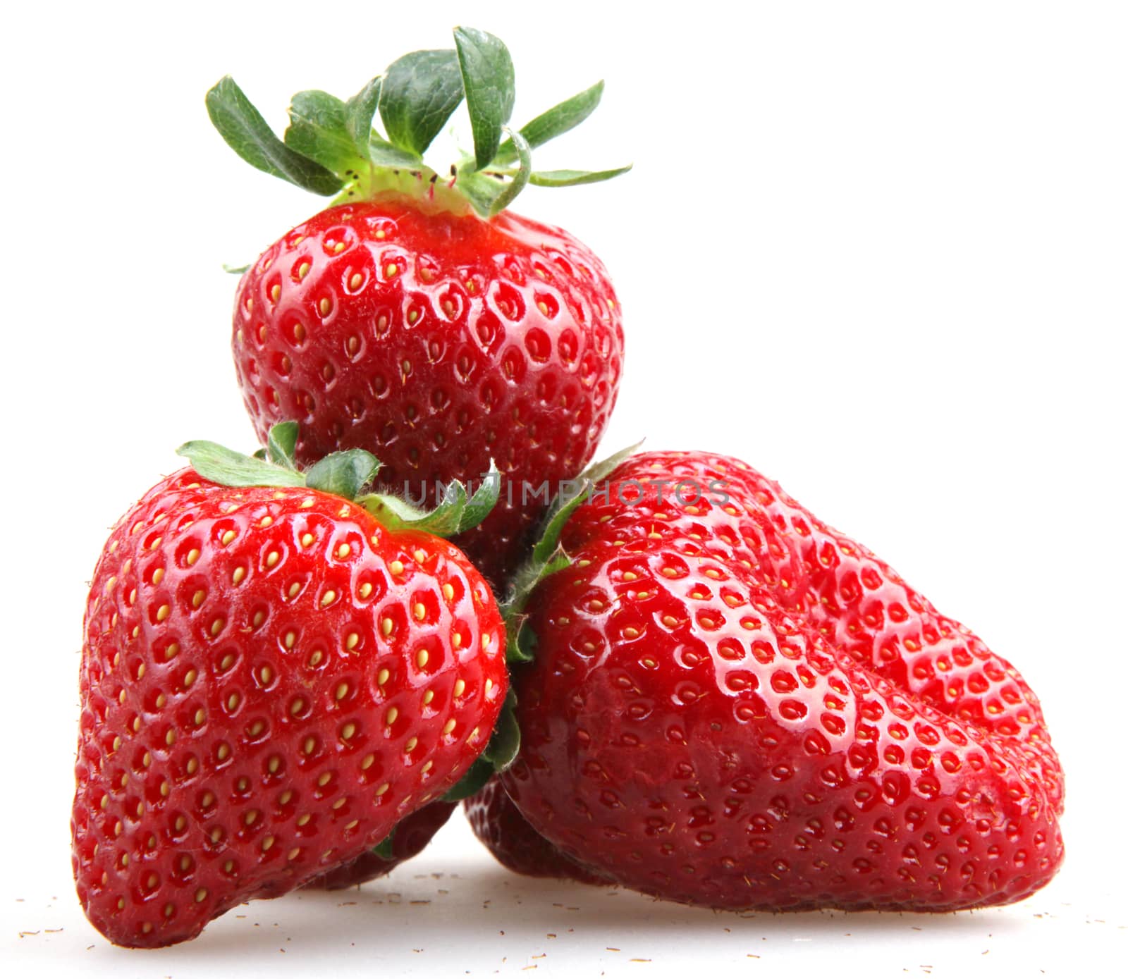 Strawberries With Leaves Isolated On A White Background