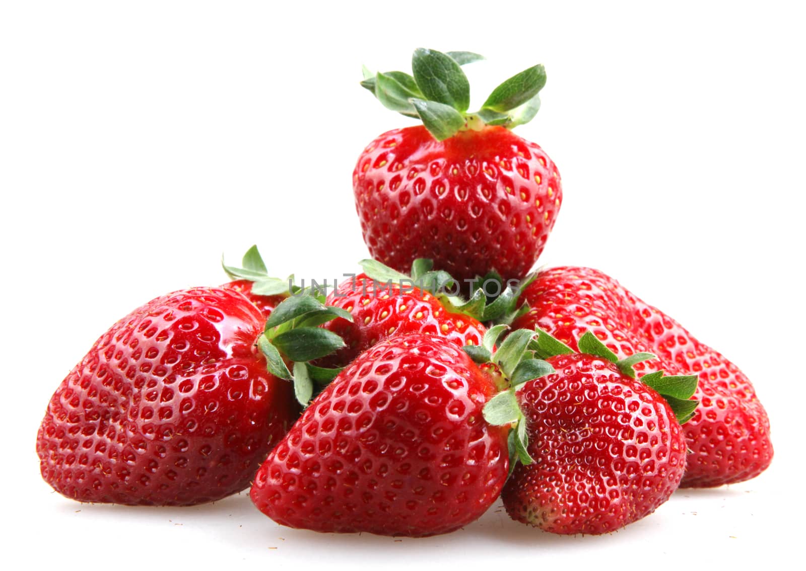 Strawberries With Leaves Isolated On A White Background