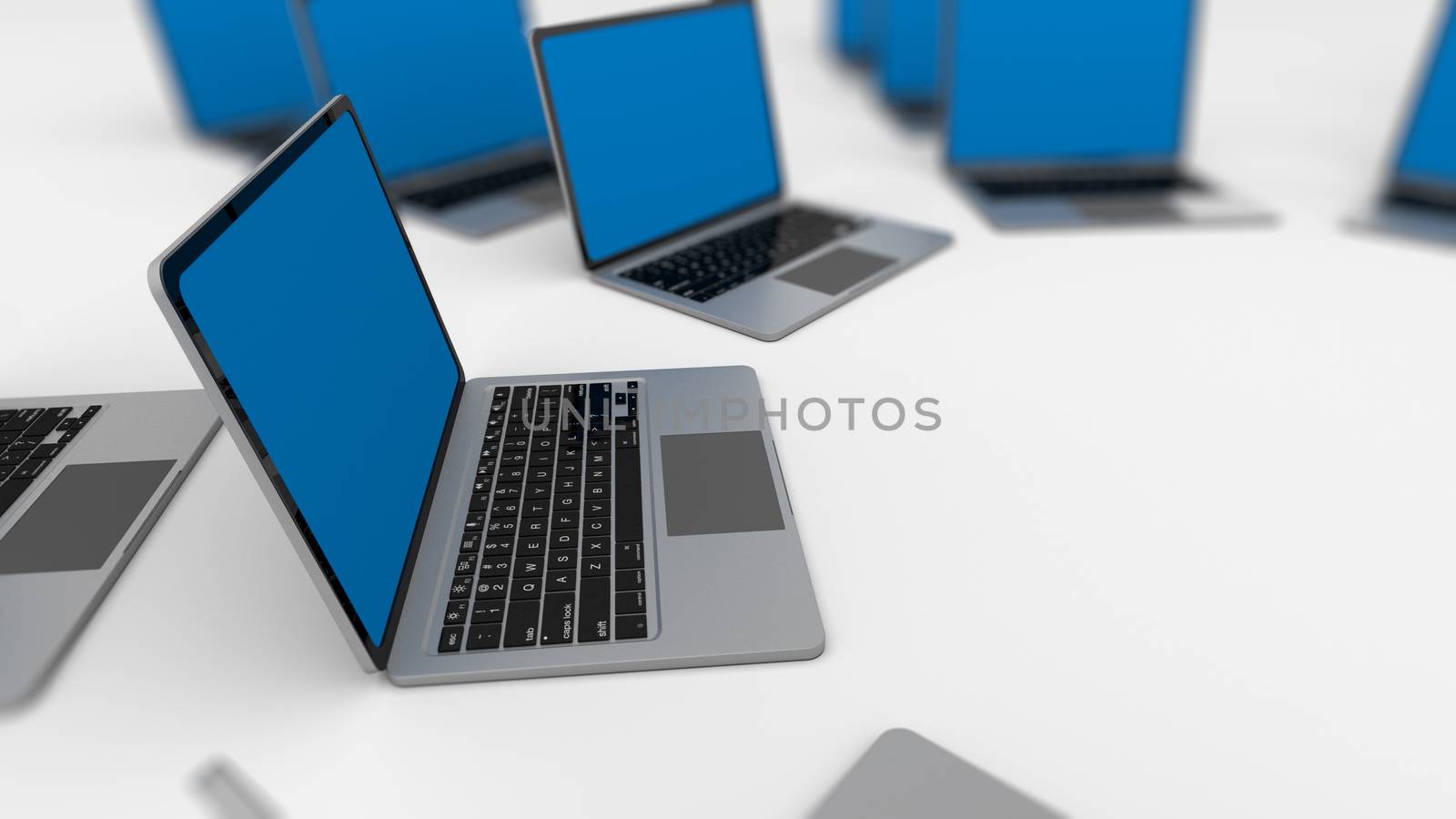 3d render of a lot of laptops in a row. Shallow Depth of field.