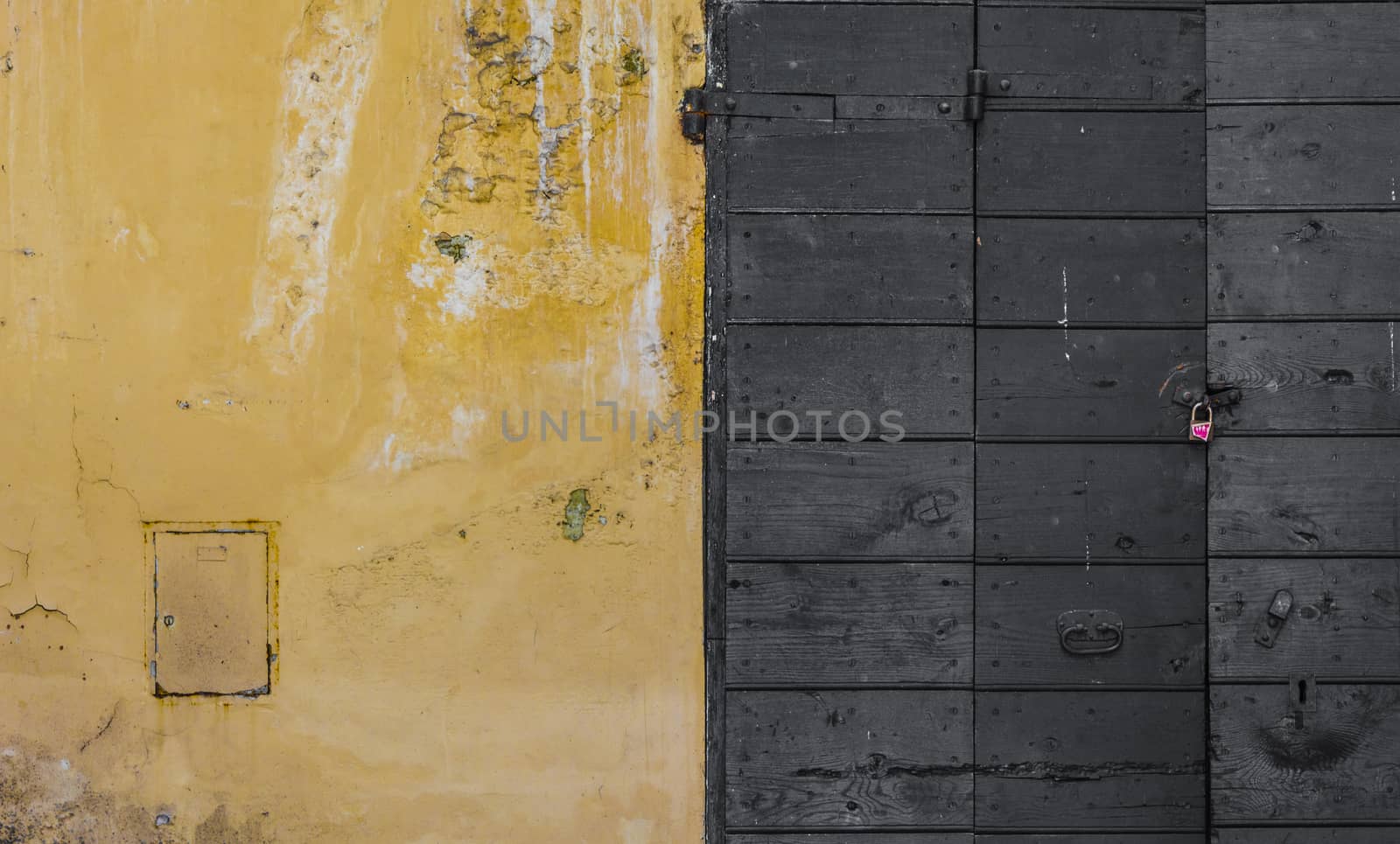 Scraped wall and a wooden door