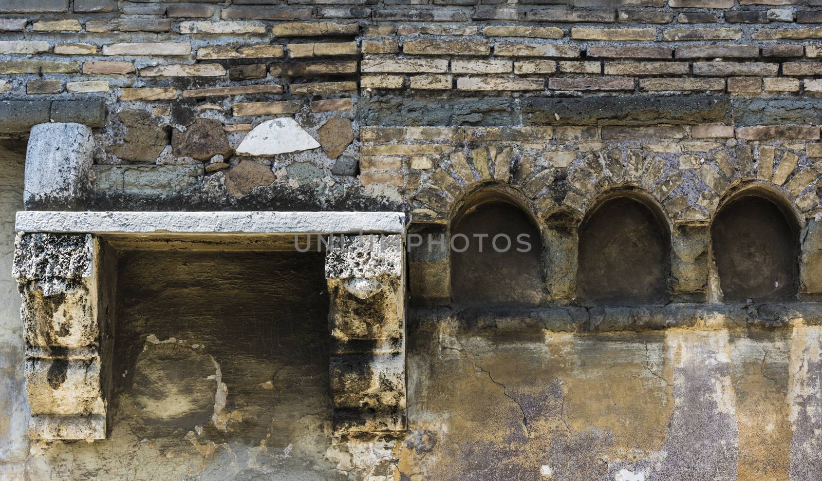 Old wall with bricks and arches by rarrarorro