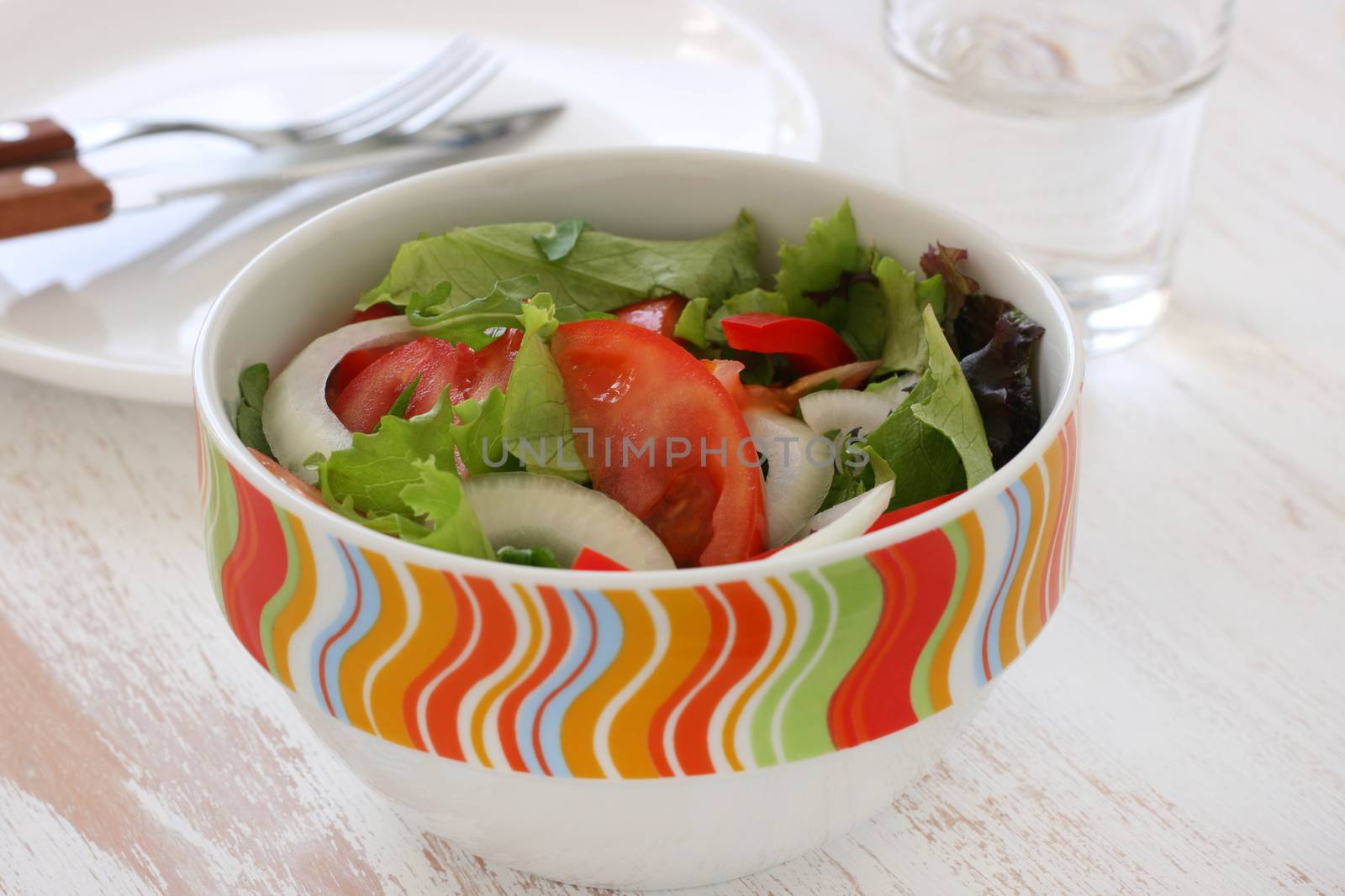 salad in bowl by nataliamylova