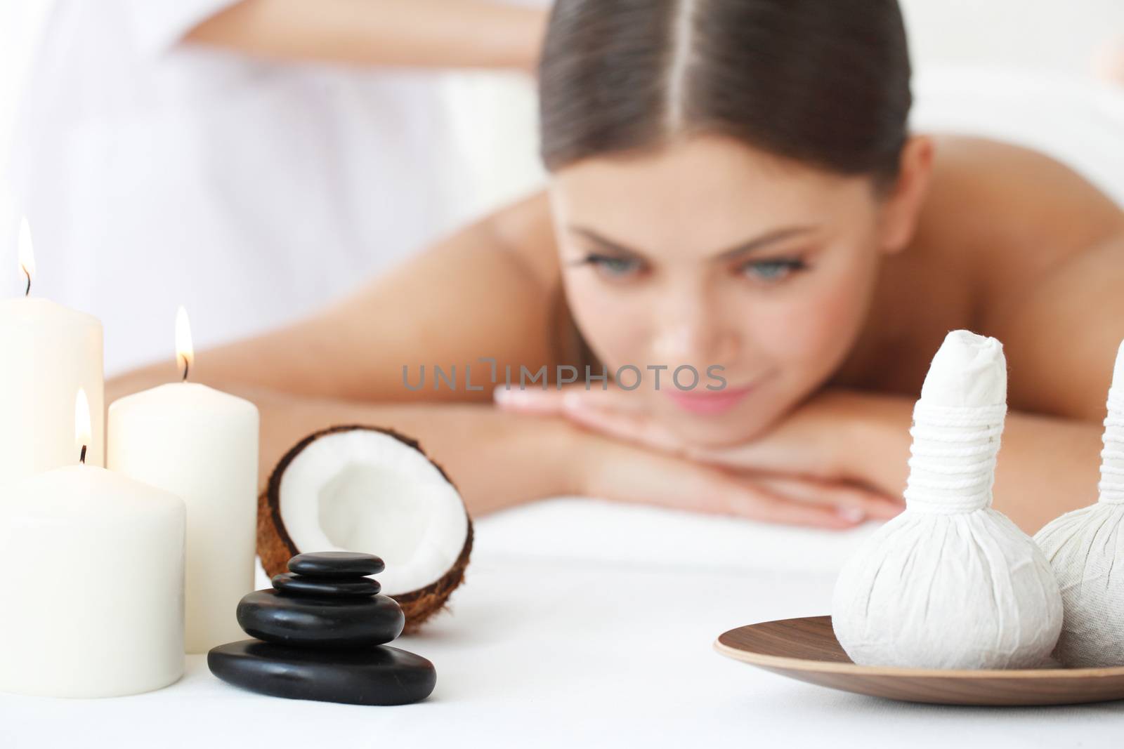 beautiful young woman at spa session