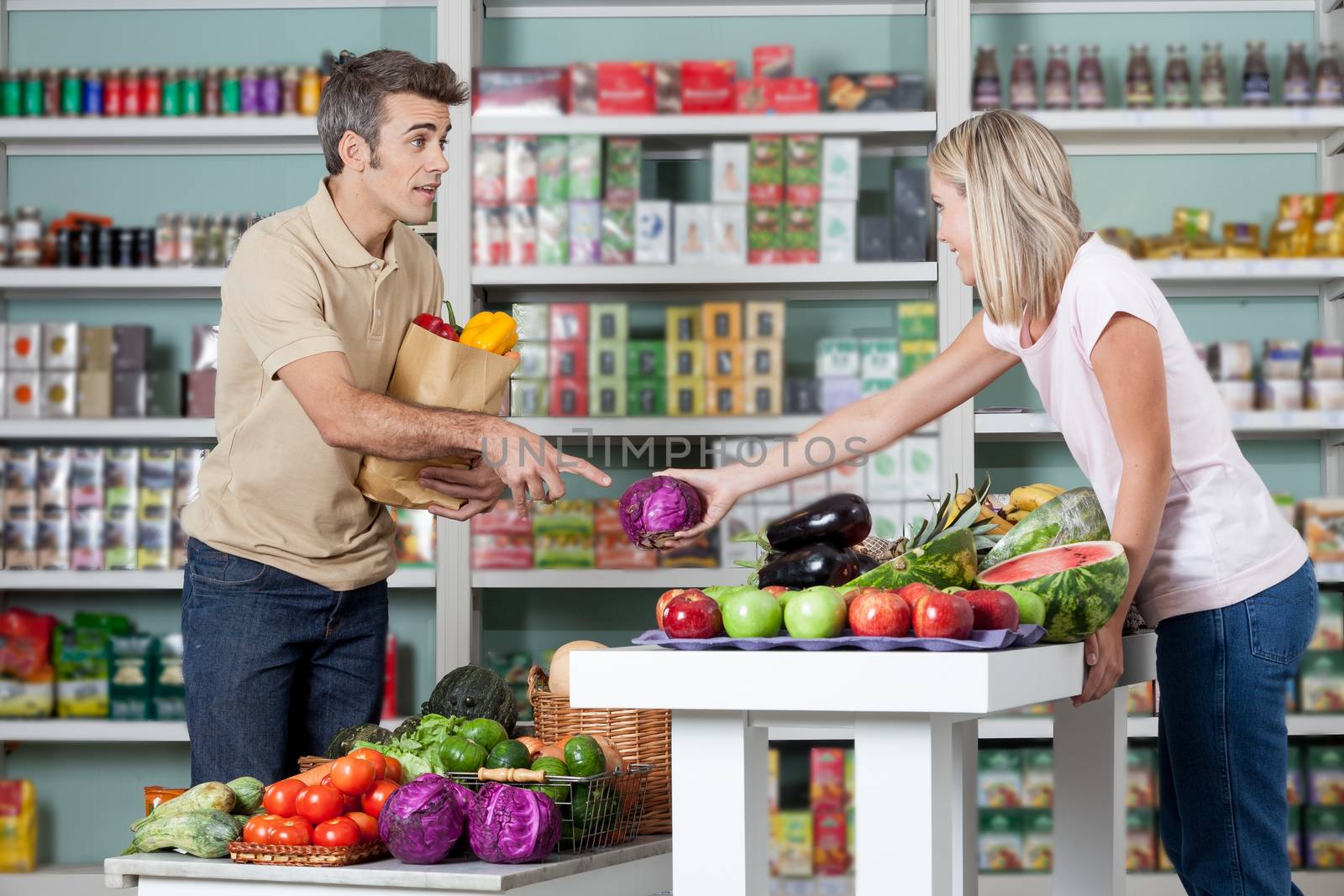 Couple shopping a vegetables