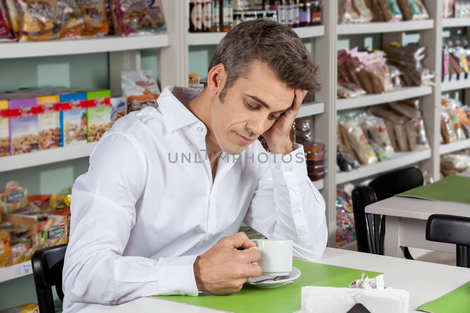 man drinking a coffee