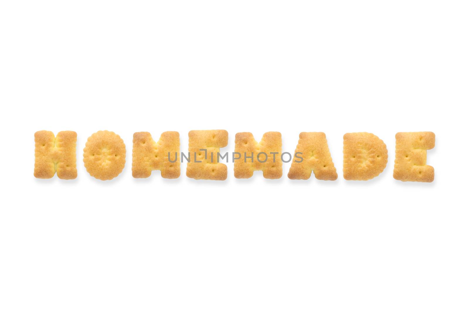 Collage of the character word HOMEMADE. Alphabet biscuit cracker isolated on white background