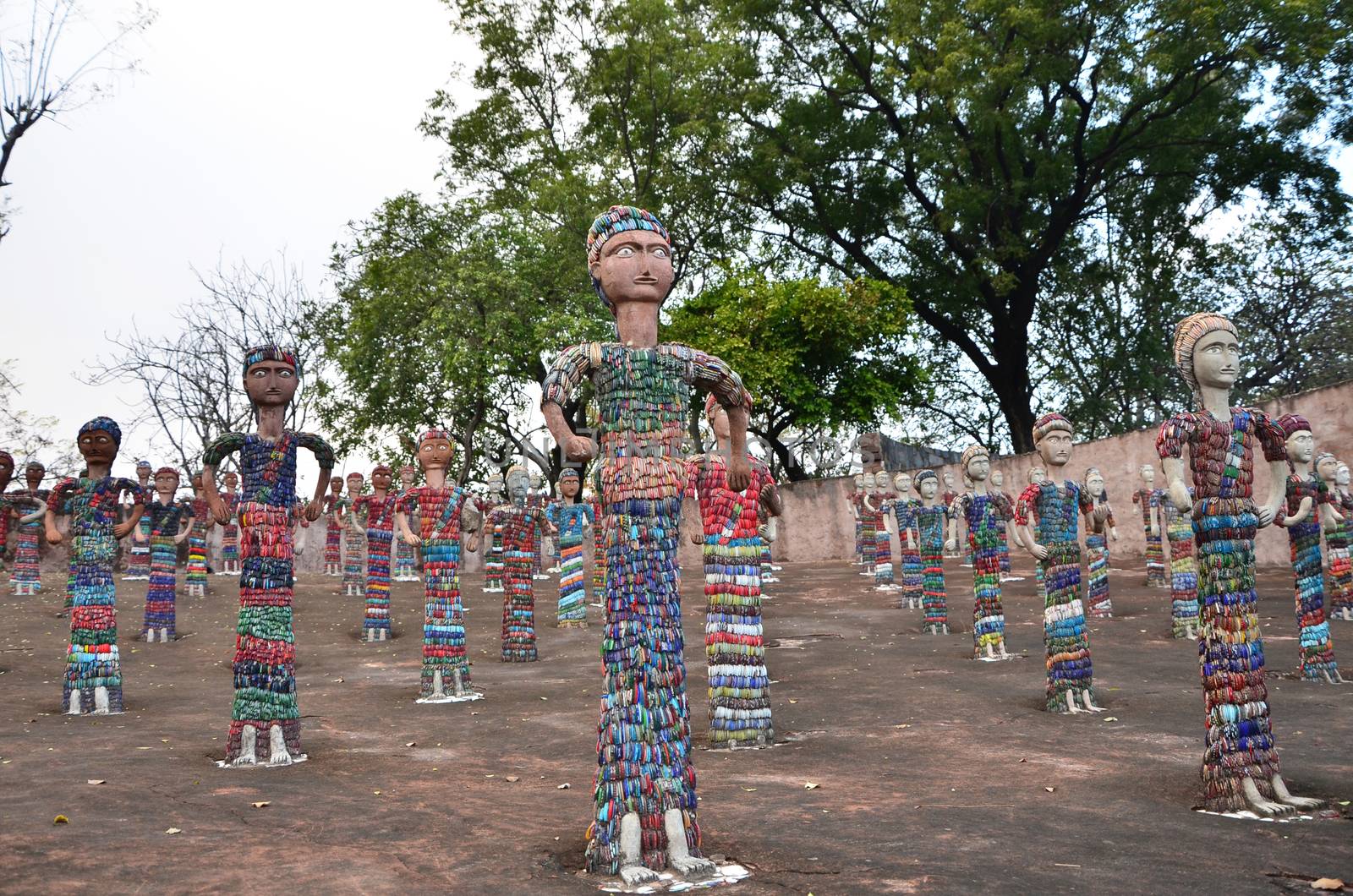 Chandigarh, India - January 4, 2015: Rock statues at the rock garden on January 4, 2015 in Chandigarh, India. The rock garden was founded by artist Nek Chand in 1957 and is made completely of recycled waste.