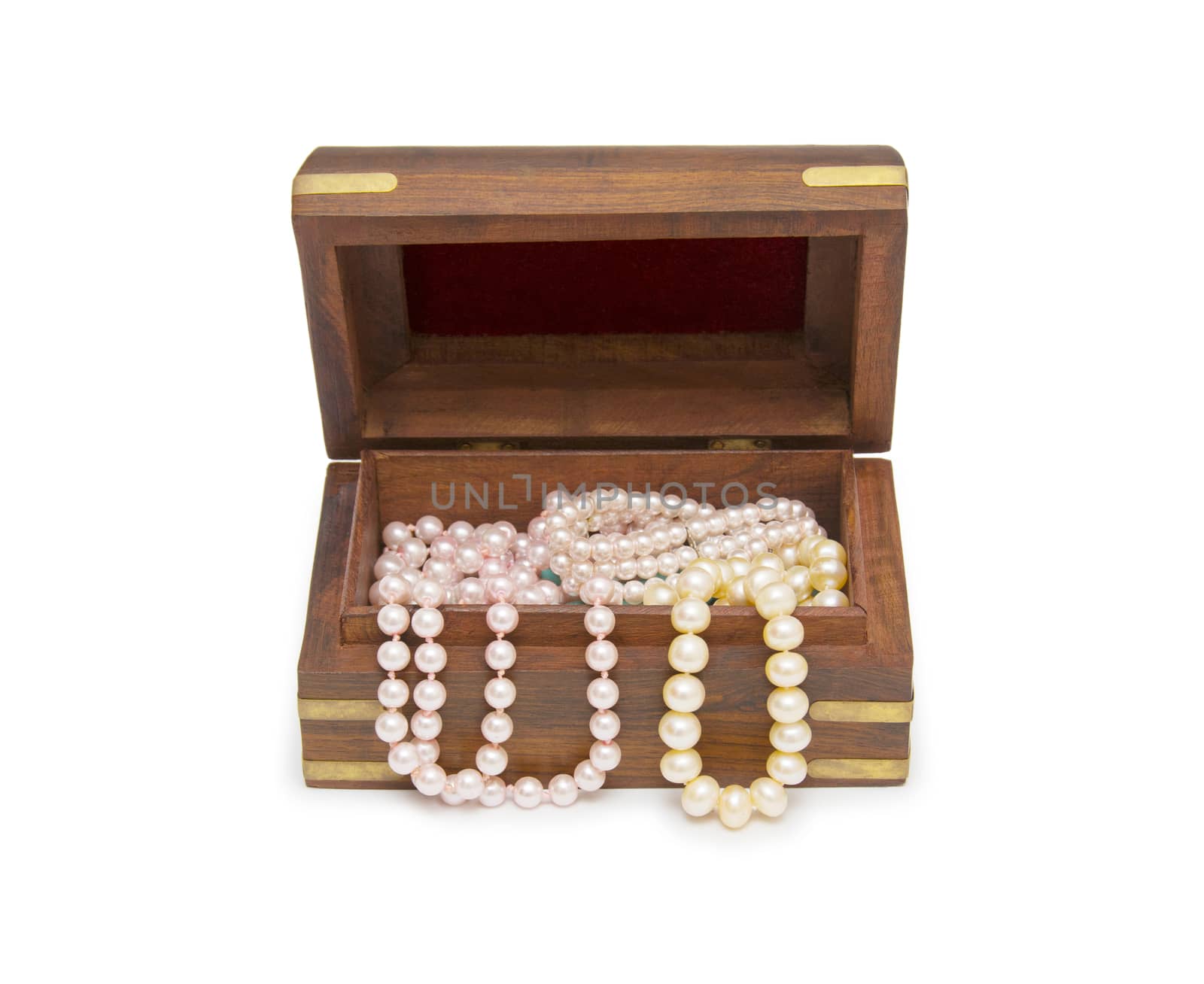 Small wooden chest with pearl necklace by cocoo
