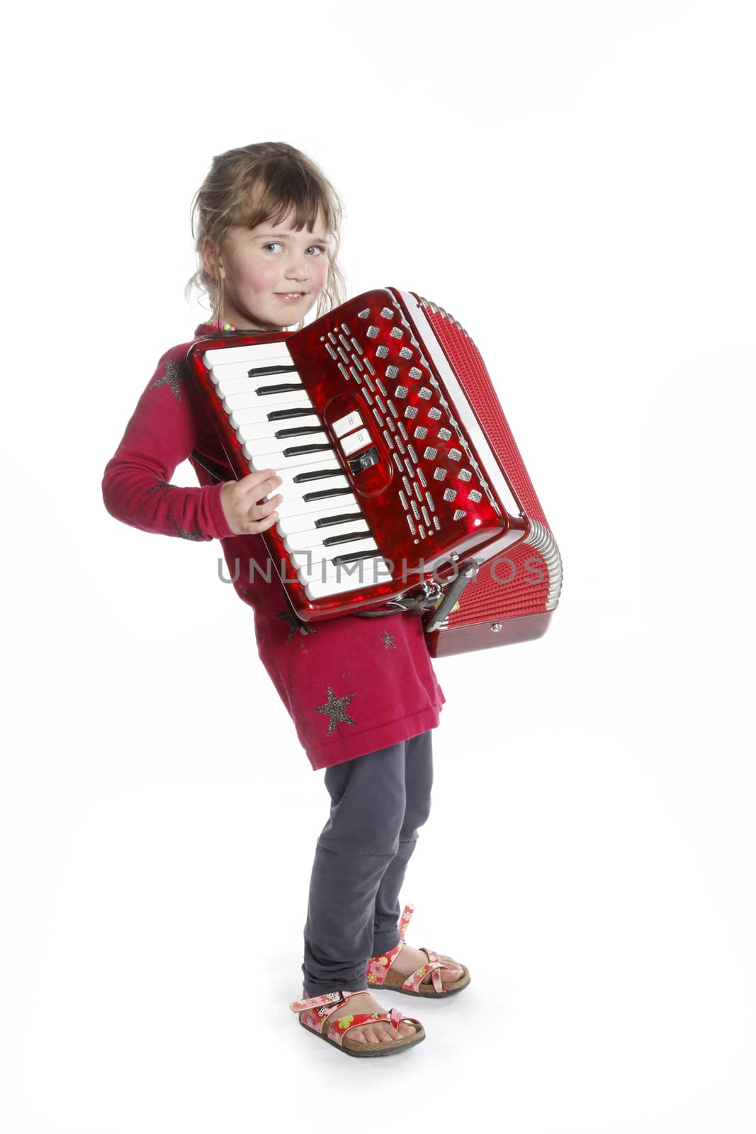 very young girl with accordion in studio by ahavelaar