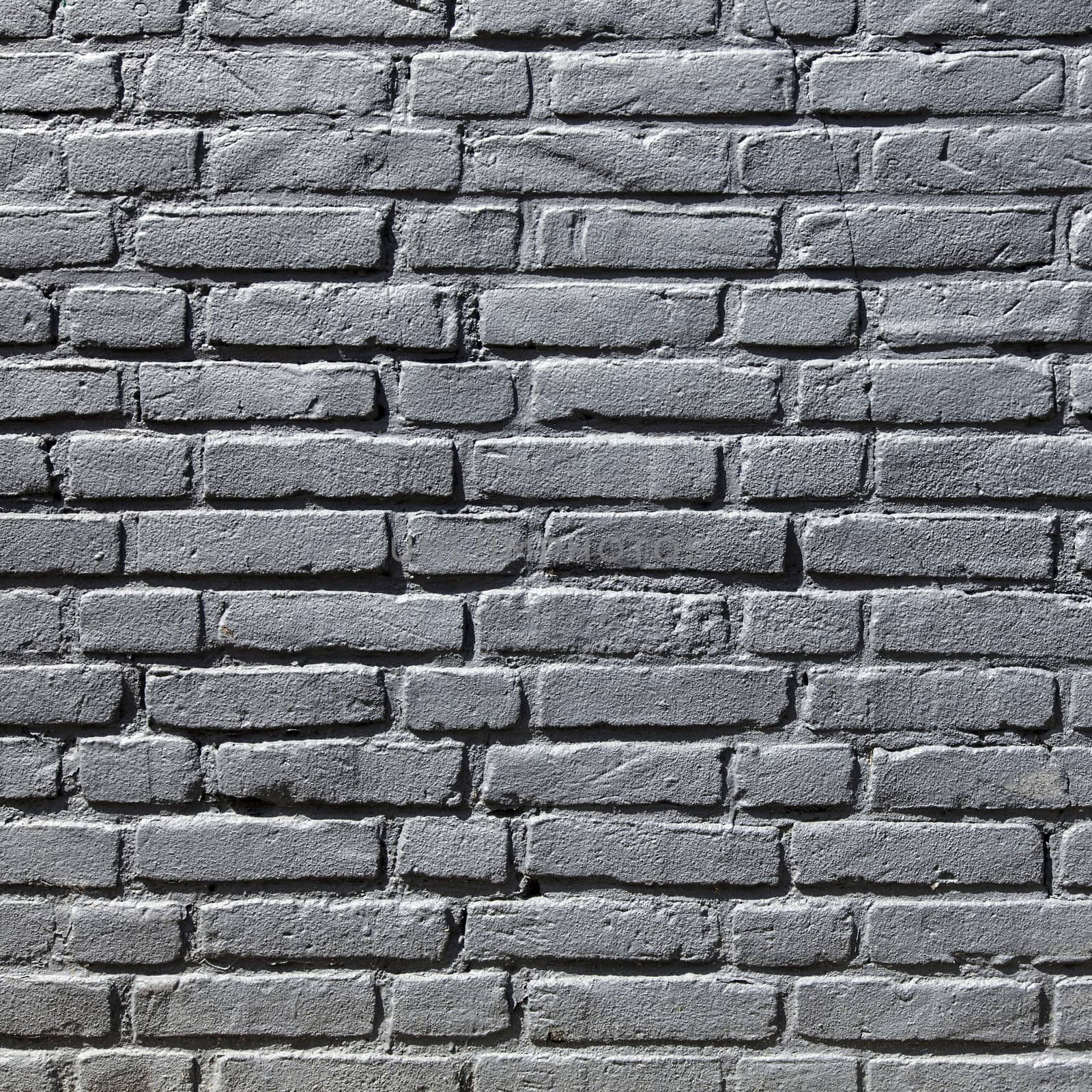 part of grey painted brick wall by ahavelaar