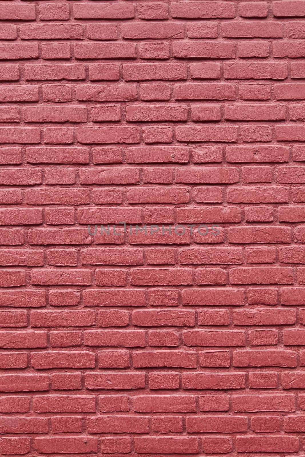 vertical part of red painted brick wall