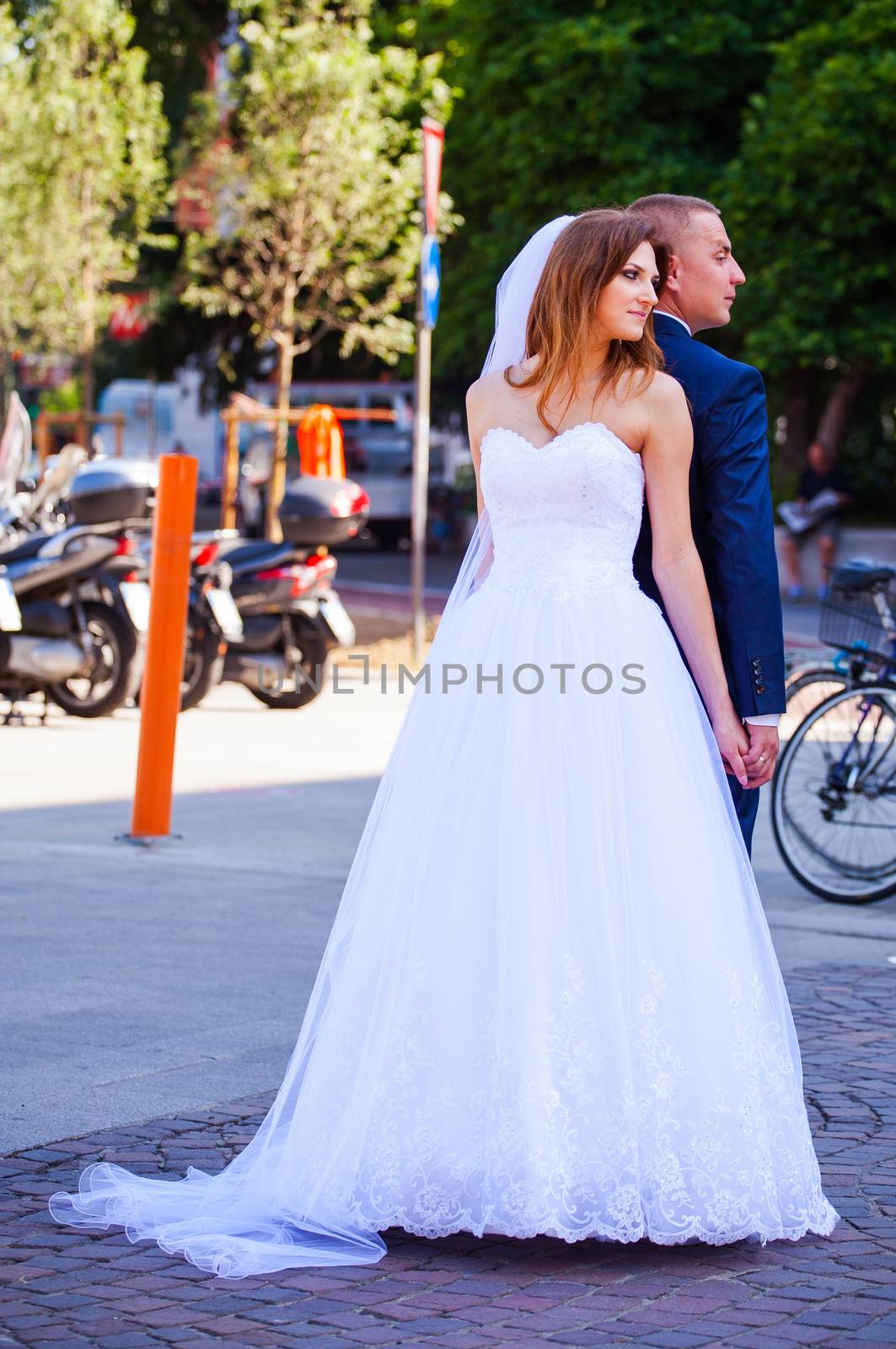 MILAN, ITALY - MAY, 15: Bride and groom posing for photo shooting on May 15, 2015