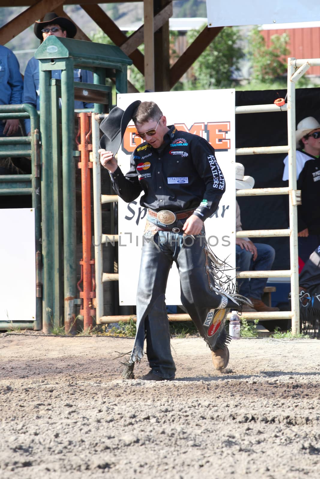 MERRITT, B.C. CANADA - May 30, 2015: Bull rider riding in the first round of The 3rd Annual Ty Pozzobon Invitational PBR Event.
