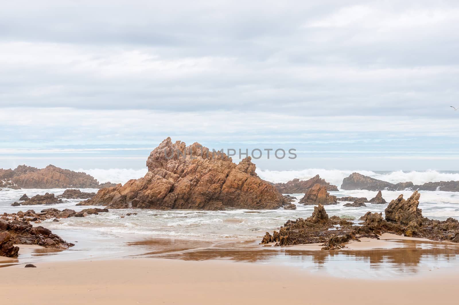 Stormy weather at a beach near Buffelsbaai (Buffalo Bay) at Knysna, South Africa