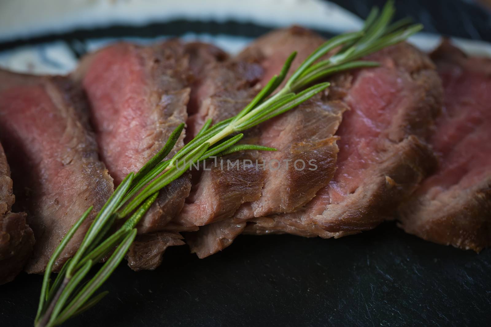 Medium Rare Cooked Beef Roast with Vegetables and Spices