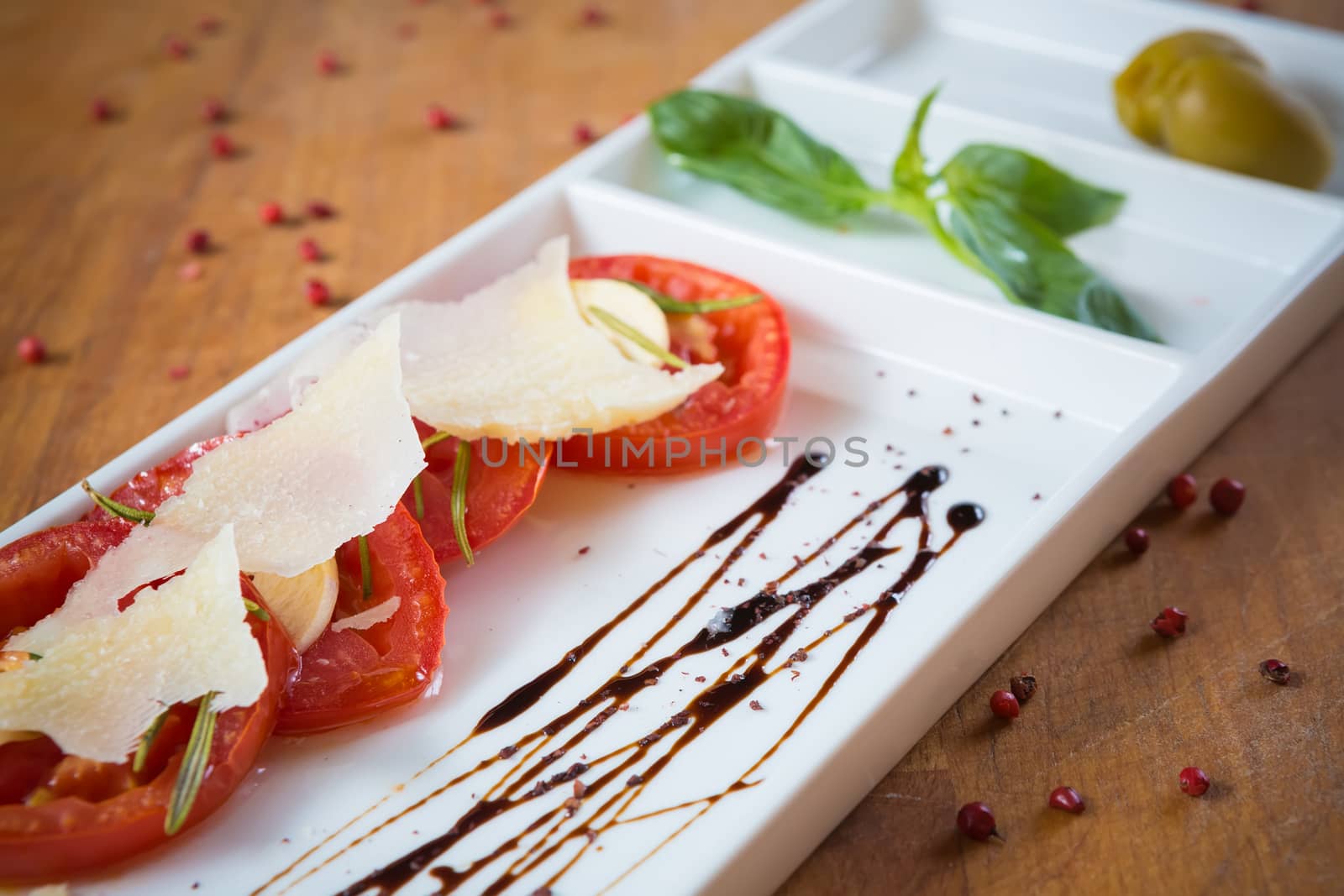 Fresh tomatoes, basil, garlic and parmesan cheese. Shallow dof