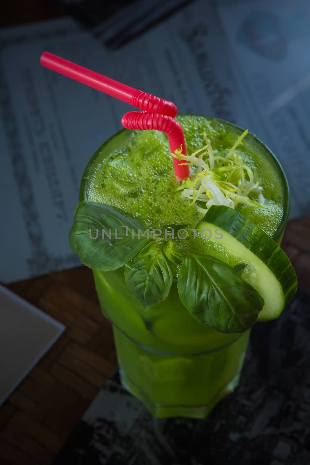 tropical green cocktail with lemon and fresh mint. Shallow dof