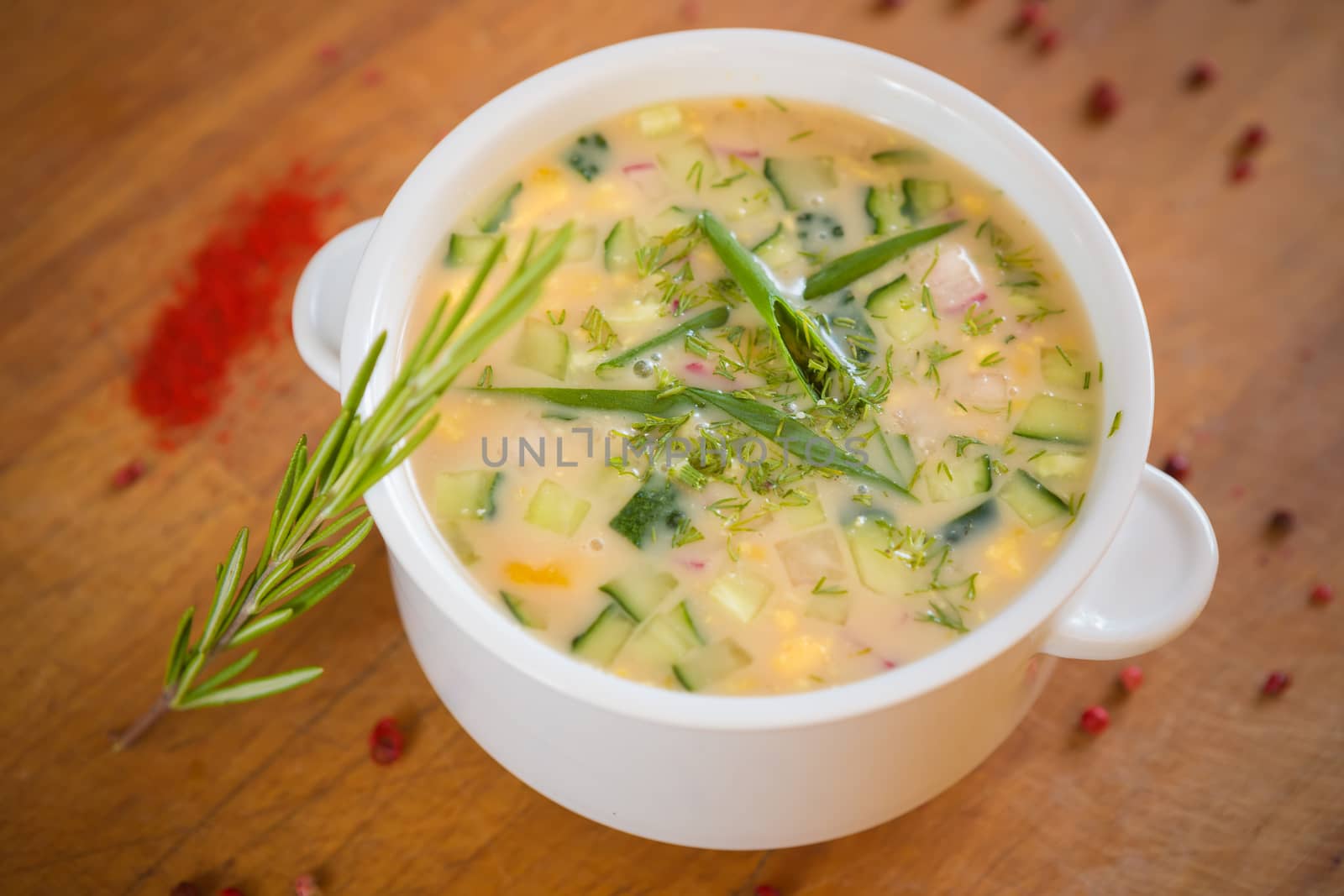 Close-up of russian cold vegetable soup on yogurt, sour-milk base -  okroshka