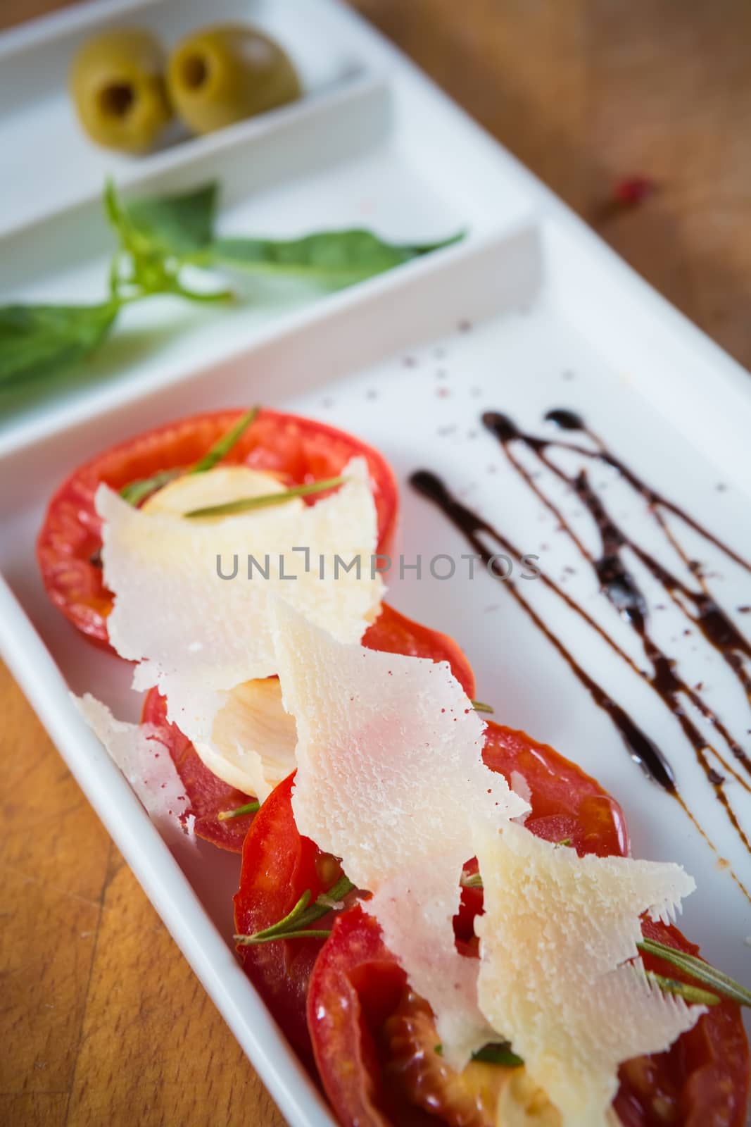 Fresh tomatoes, basil, garlic and parmesan cheese. Shallow dof