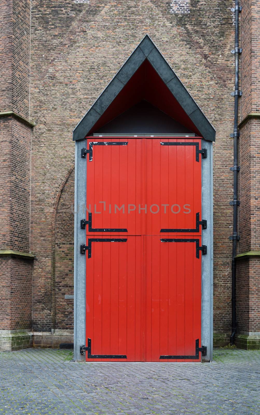 Red Door of Grote kerk (Big Church) in The Hague, Netherlands.