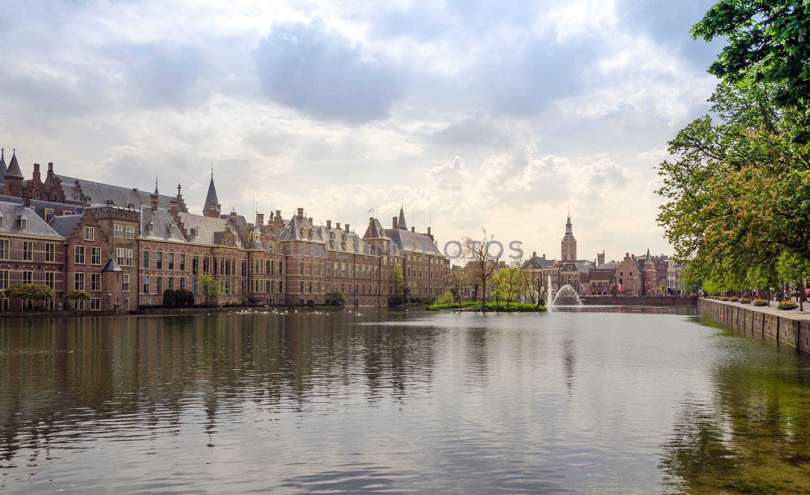 Famous parliament building complex Binnenhof in The Hague. by siraanamwong