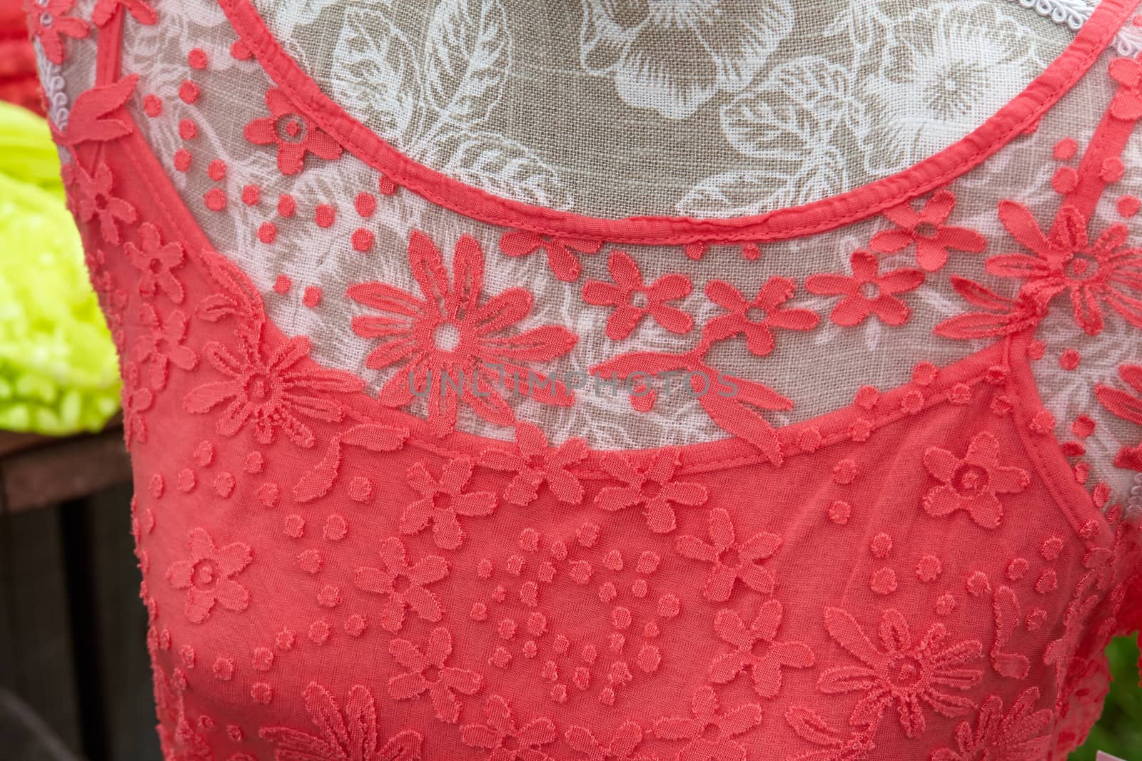 Closeup details of a woman fashionable classic red lace blouse shirt                               