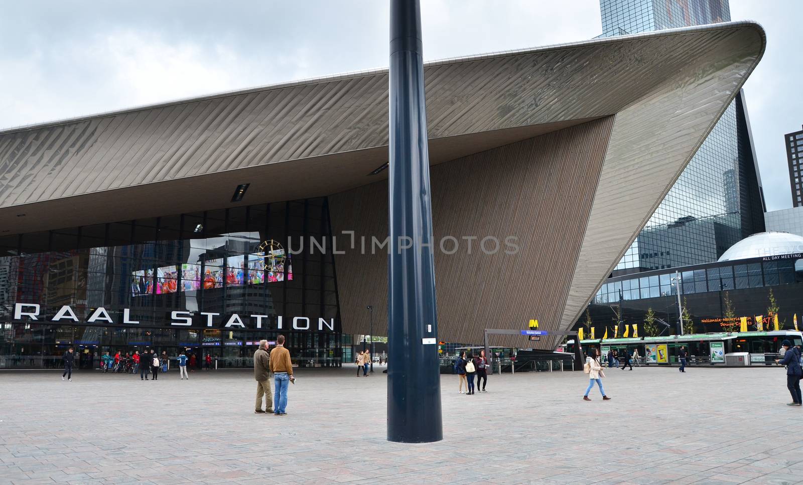 Rotterdam, Netherlands - May 9, 2015: Passengers at Rotterdam Central Station. on May 9, 2015. The station received an average of 110,000 passengers daily in 2007.