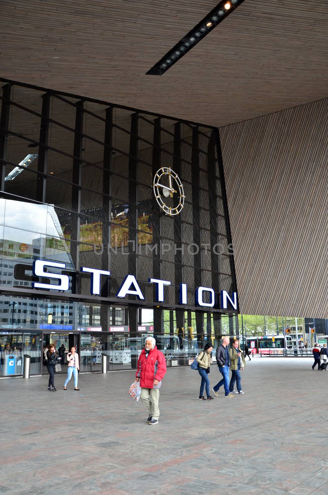 Rotterdam, Netherlands - May 9, 2015: Passengers at Rotterdam Central station by siraanamwong