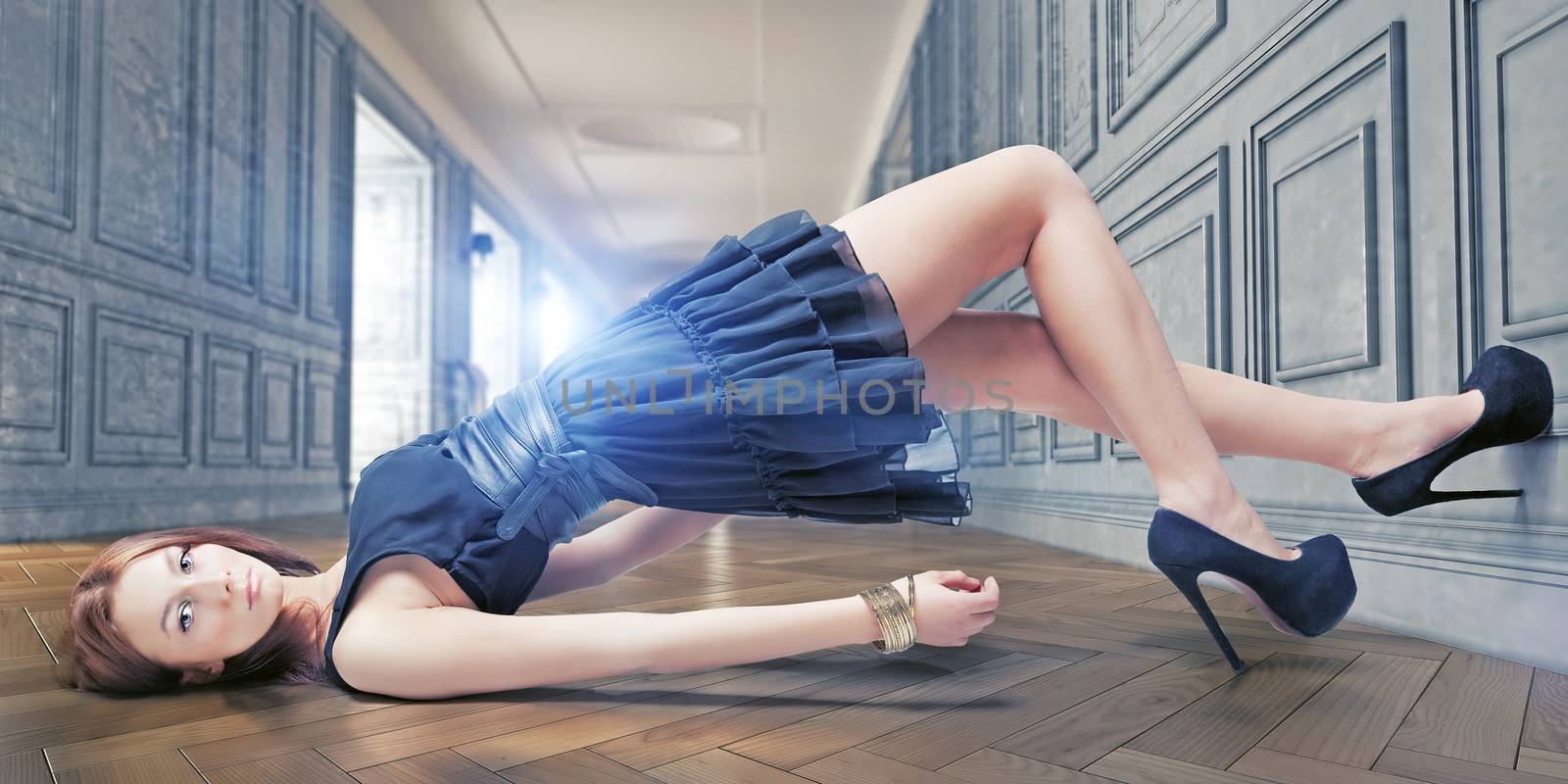 Beauty red-hair  girl lying on the floor in luxury interior. Beautiful depth of field effect